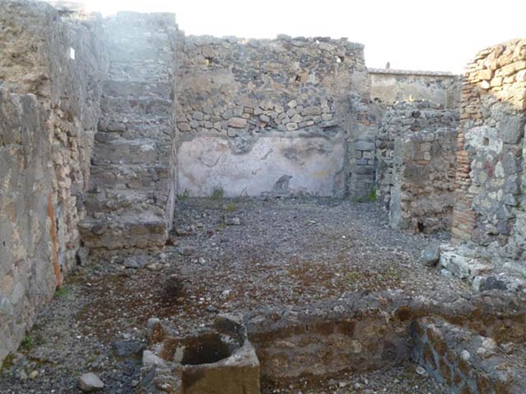 VI.2.26 Pompeii. May 2011. Looking north in yard. On the right can be seen the two doorways, the furthest away belonging to the cubiculum on the east side of the yard. The nearest doorway on the right would lead into the corridor leading to the front of the house, and the workshop.  
