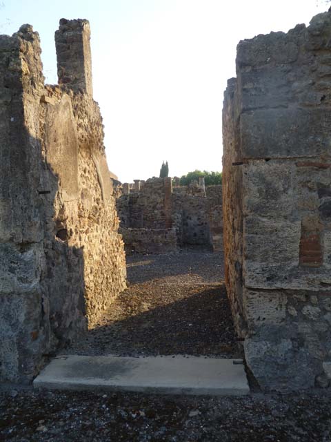 VI.5.19 Pompeii. September 2005. Looking south-east to room in corner of atrium.