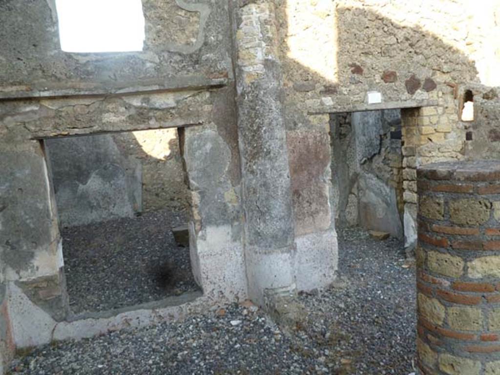 VI.7.1 Pompeii. May 2011. Looking east towards window and doorway to triclinium.