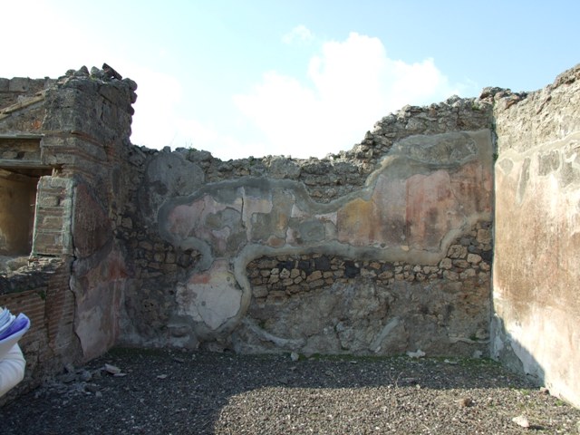 VI.7.6 Pompeii. March 2009. Room 10, south wall of triclinium, with leaning west side. Looking south.

