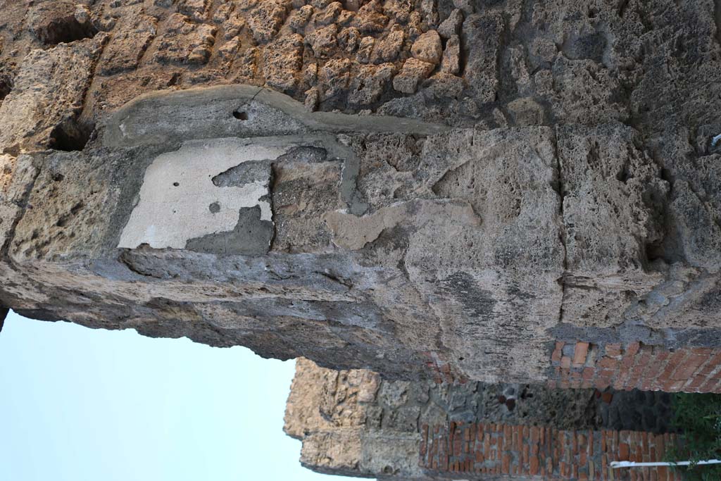 VI.7.9 Pompeii. December 2007. Niche in south ala, with head of the Gorgon.