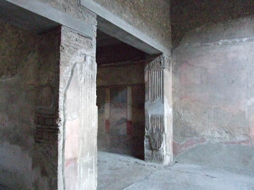 VI.8.23 Pompeii. December 2006. Looking towards rooms on west side of atrium. On the left is a corridor, in the centre is the tablinum.
