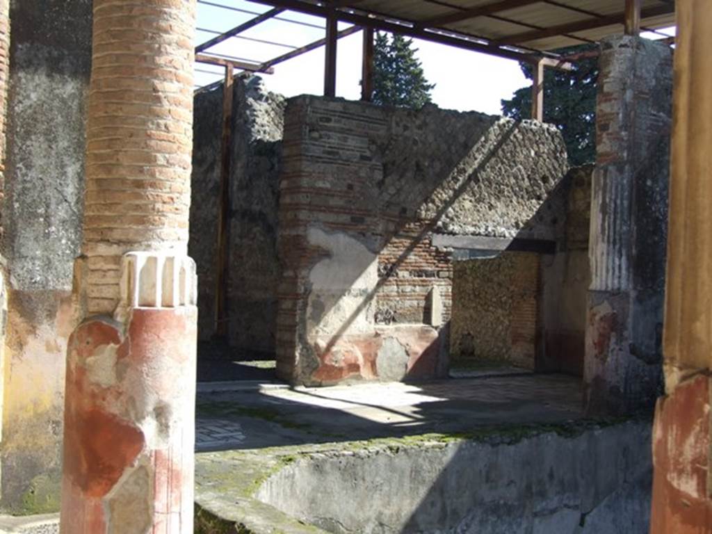 VI.9.6 Pompeii. March 2009. Room 6, east end of peristyle with two pilasters and east wall, with doorways to rooms 22 and  24.