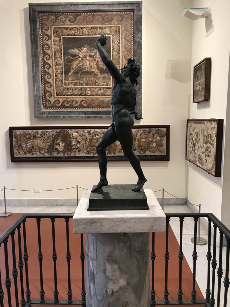 VI.12.2 Pompeii. April 2019. Display of mosaics from the House of the Faun, seen in Naples Museum.
The mosaic of the child Dionysus astride an animal is seen here to demonstrate the size of the floor emblema.
Photo courtesy of Rick Bauer.
