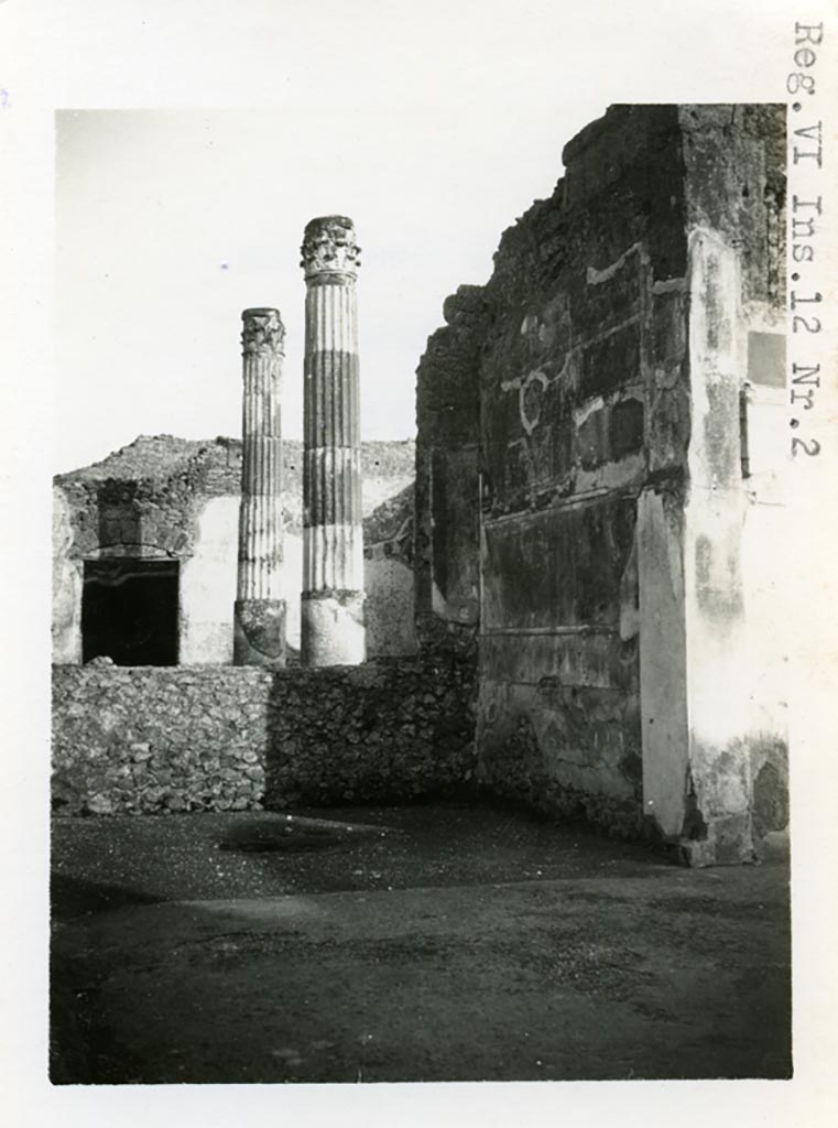 VI.12.2 Pompeii. Pre-1937-39. 
Ala 30, on east side of atrium, looking towards south-east corner, with atrium of VI.12.5 at rear.
Photo courtesy of American Academy in Rome, Photographic Archive. Warsher collection no. 031.
