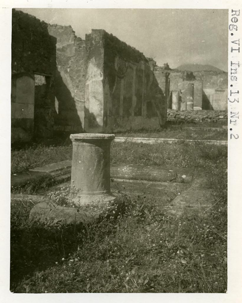 VI.13.2 Pompeii. Pre-1937-39. 
Looking across impluvium in atrium towards the west wall of the tablinum, still with painted decoration.
Photo courtesy of American Academy in Rome, Photographic Archive. Warsher collection no. 1423.
