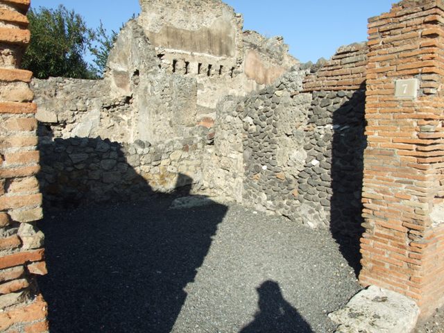 VI.14.7 Pompeii. December 2007. Remains of base of staircase to upper floor, in north-east corner.