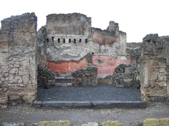 VI.14.8 Pompeii. December 2006. Doorway to small room on right side, with stairs to upper floor ? According to Helbig, visible in the second rear room on the left was an unclear painting. See Helbig, W., 1868. Wandgemälde der vom Vesuv verschütteten Städte Campaniens. Leipzig: Breitkopf und Härtel. (1387b).  According to Fiorelli, the painting perhaps showed two litigants in the presence of a magistrate? See Pappalardo, U., 2001. La Descrizione di Pompei per Giuseppe Fiorelli (1875). Napoli: Massa Editore. (p.157).  According to Eschebach, this may also have been known as the “Casetta dei Litiganti”, presumably named from the painting.  See Eschebach, L., 1993. Gebäudeverzeichnis und Stadtplan der antiken Stadt Pompeji. Köln: Böhlau. (p.209)
