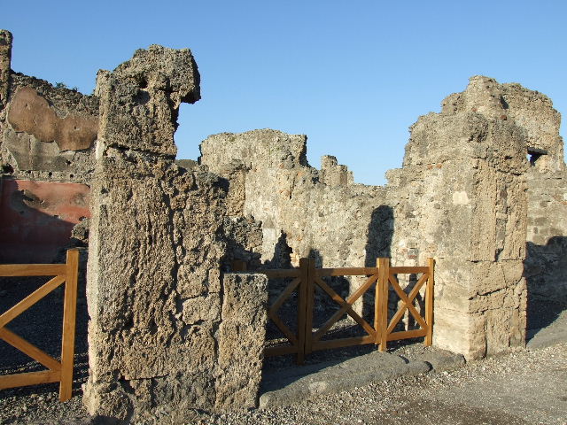 VI.14.9 Pompeii. December 2006. Looking north-east towards small room or cupboard at rear of light-yard.