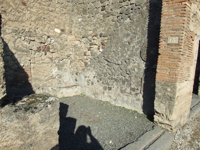 VI.14.13 Pompeii. December 2007. Stone structure in north-east corner, possibly for amphorae

