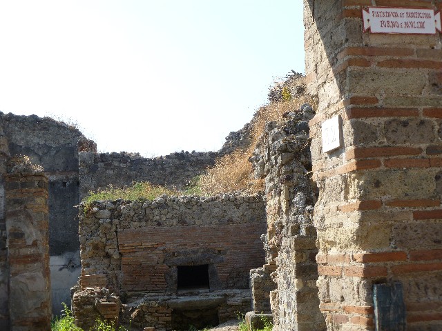 VI.14.32 Pompeii. July 2010. Plaque on west side of entrance doorway. Photo courtesy of Michael Binns.