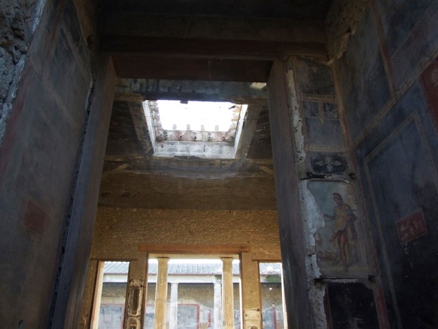 VI.15.1 Pompeii. December 2006. Detail of painting in Atrium on doorway to bedroom on left of main entrance.
