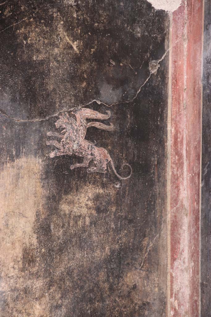 VI.15.1 Pompeii. October 2020. 
Painting of griffin on west wall of vestibule. Photo courtesy of Klaus Heese.
