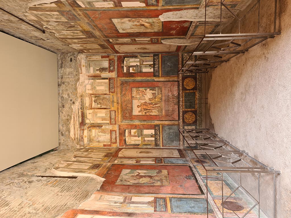 VI.15.1 Pompeii. December 2006. Exedra. East wall. Wall painting of the Torture of Ixion on the Wheel.