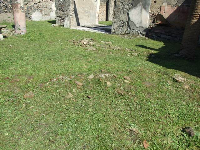 VI.15.5 Pompeii. March 2009. Room 21, remains of latrine, on north side of blocked door.