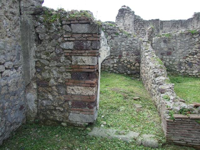 VI.15.6 Pompeii. March 2009. Room 6. Corridor leading west to rear rooms.