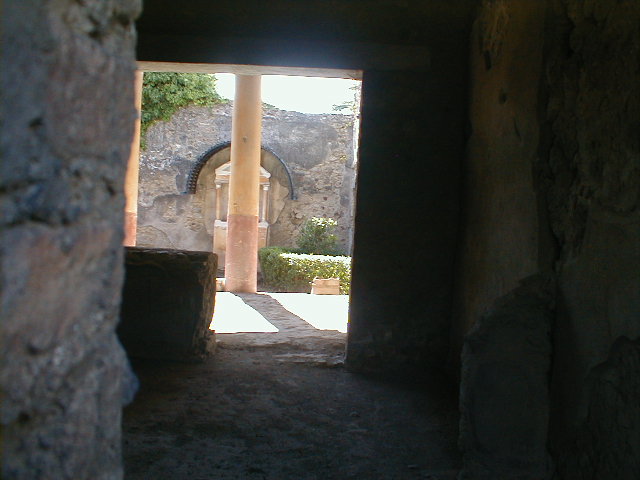VI.15.7 Pompeii, stairway to upper apartment with VI.15.8 at rear. May 2005.

