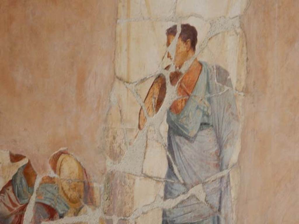 VI.16.7 Pompeii. May 2016. Room G, detail from western side of central wall painting on south wall of oecus.  Photo courtesy of Buzz Ferebee.
