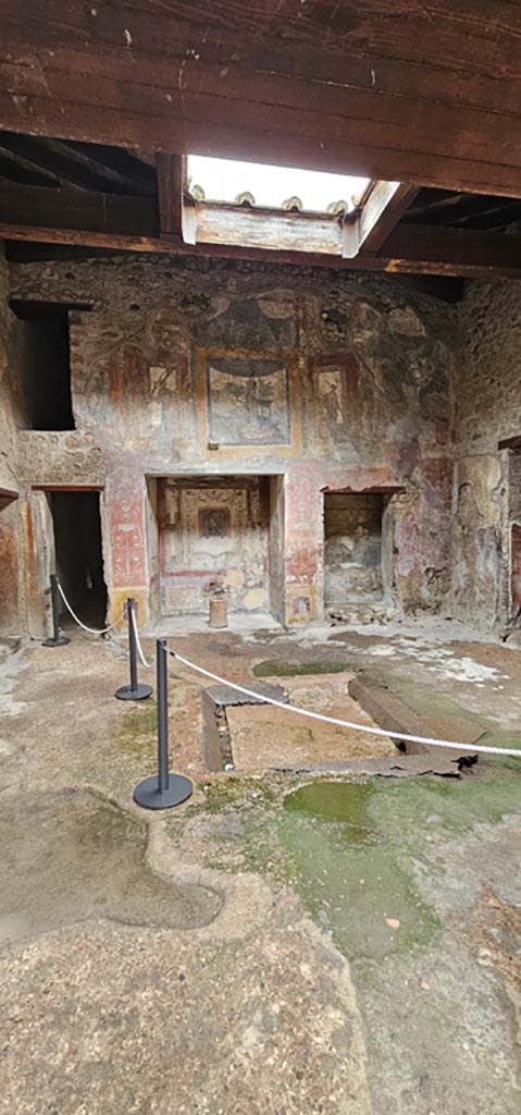 VI.16.15 Pompeii. December 2023. 
Looking west across atrium flooring towards impluvium.
Photo courtesy of Miriam Colomer.
