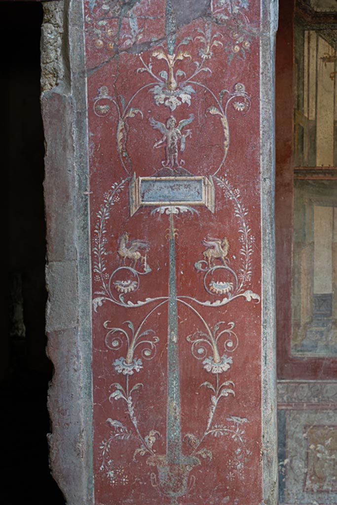 VI.16.15 Pompeii. January 2024. 
Detail of painted pilaster on west side of atrium B. Photo courtesy of Johannes Eber.
