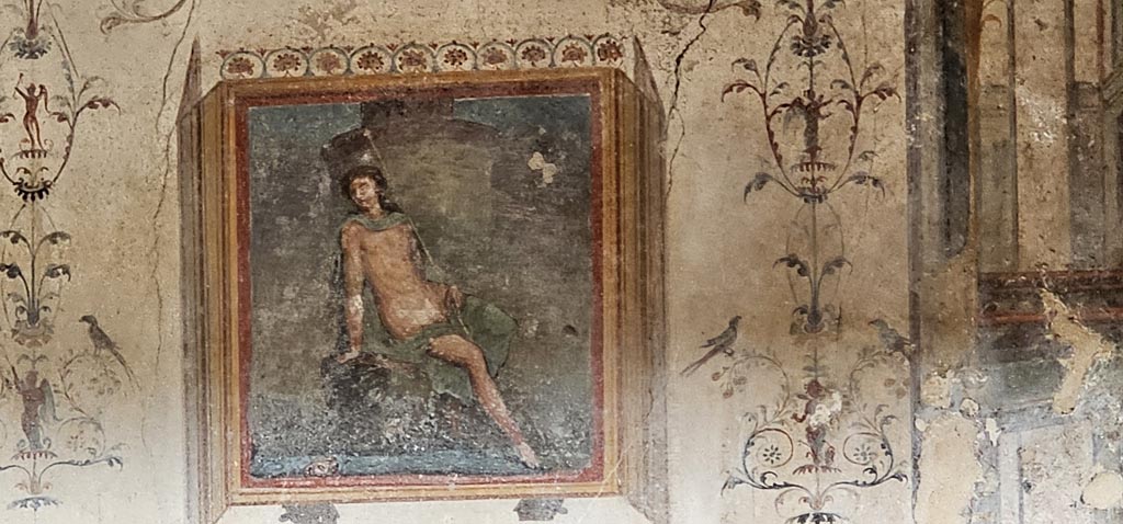 VI.16.15 Pompeii. December 2023. Detail of painted decoration on west side of atrium B. Photo courtesy of Miriam Colomer.