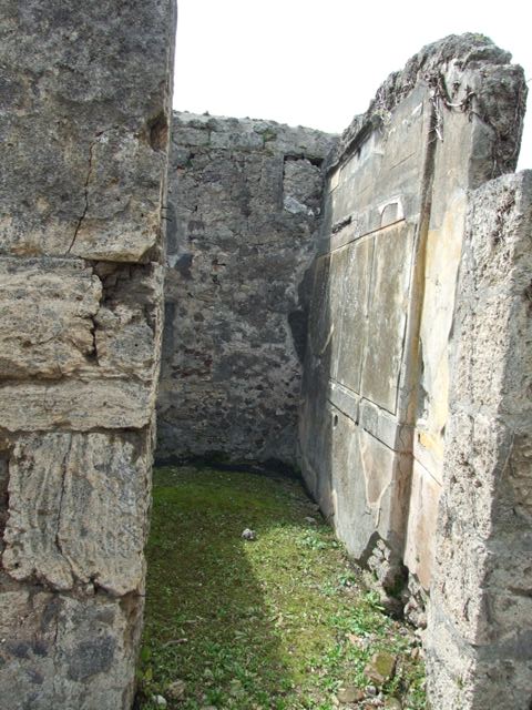 VI.16.27 Pompeii. March 2009. Doorway to room 18, and north wall of entrance corridor or fauces of VI.16.26.  

