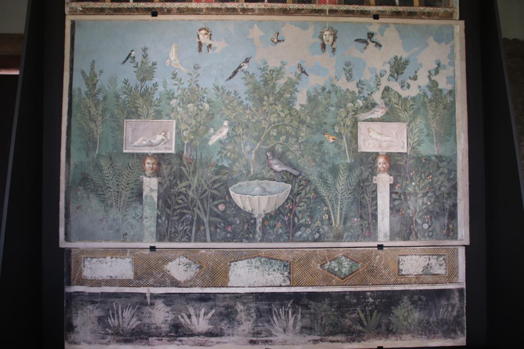 VI.17.42 Pompeii. October 2022. 
Oecus 32, painted north wall from large reception room decorated with luxurious garden. On display in exhibition in Palaestra. 
Photo courtesy of Klaus Heese. 
