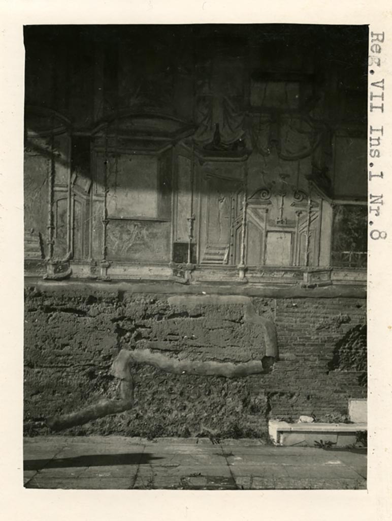 VII.1.8 Pompeii. Pre-1937-39. 
South-west corner of gymnasium C, detail of stucco wall on south side of arched doorway. 
Photo courtesy of American Academy in Rome, Photographic Archive. Warsher collection no. 1178.

