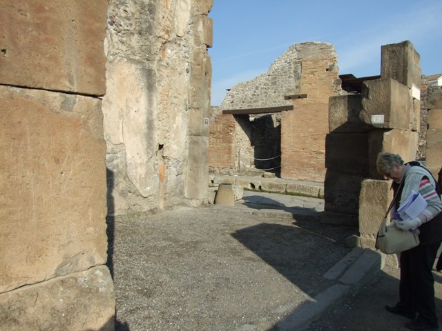 VII.1.12 Pompeii. December 2007.  North wall with outline of staircase in plaster and waste pipe from upper floor.
