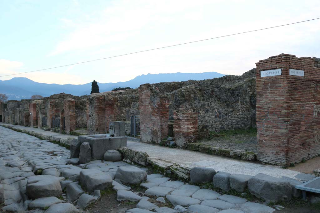 VII.1.34, Pompeii, on right. December 2018. Looking south-west along west side of Via Stabiana. Photo courtesy of Aude Durand.