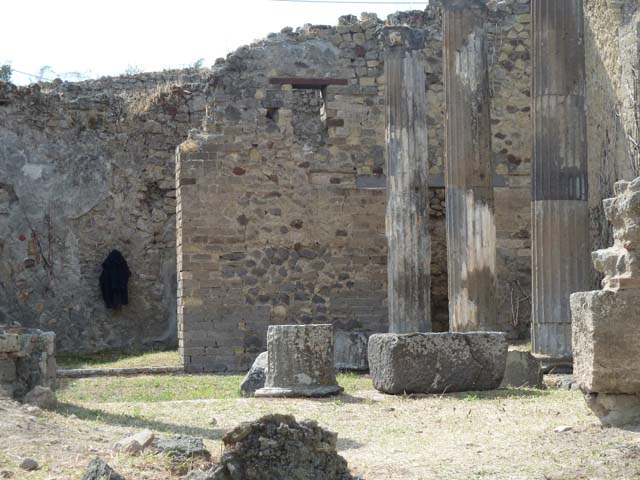 VII.2.11 Pompeii. March 2009. Oecus, looking east to atrium and impluvium of VII.2.6l, photo taken from VII.2.16.