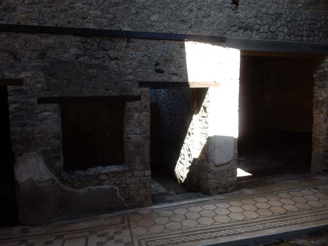 VII.2.45 Pompeii. September 2005. First room, with wall painting, on east side of atrium.