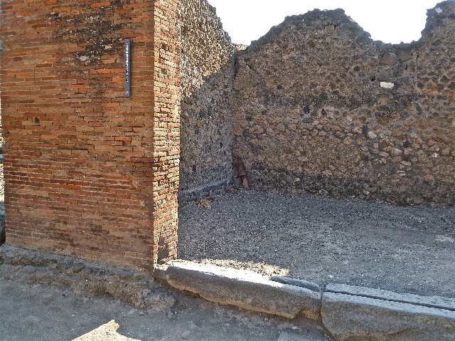 “Cornice in terracotta of a Compluvium preserved at Pompeii”.
Old photograph courtesy of Society of Antiquaries, Fox Collection.
These are Grondaia or rainwater spouts that fed rainwater from the Compluvium in the roof to the Impluvium below. These were reconstructed and displayed during the 19th century in VII.4.15/16 before the Antiquarium was opened. Mau says they were originally from a House near the Porta Marina, The plan provided by Mau can be used to identify the house as VII.16.12/15 the House of Umbricius Scaurus. See Mau, A., 1907, translated by Kelsey F. W. Pompeii: Its Life and Art. New York: Macmillan. (p.251, p.253, p.298).