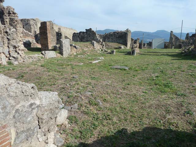 VII.6.7 Pompeii. Abt. 1870. Looking north from above atrium of VII.6.7.
The entrance doorway would have been the one on the right of the centre of the photo. This shows the north wall of the atrium, at the rear of VII.6.4, 5 and 6.