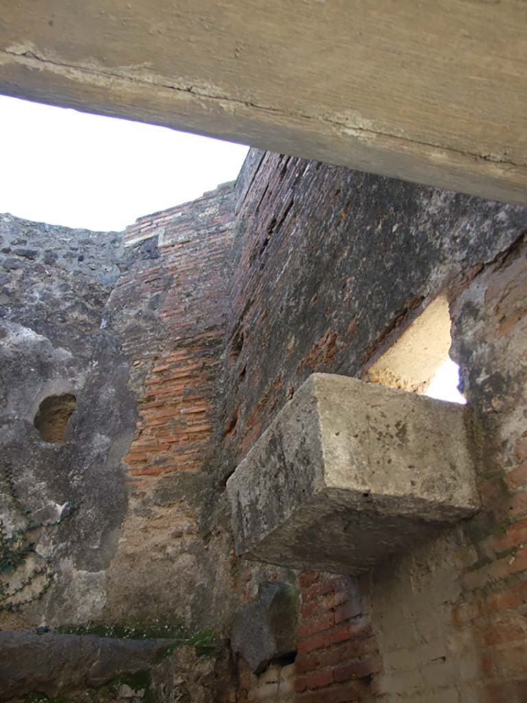 VII.9.1 Pompeii. May 2015. Looking towards floor at south end of porter’s room 8.
Photo courtesy of Buzz Ferebee.

