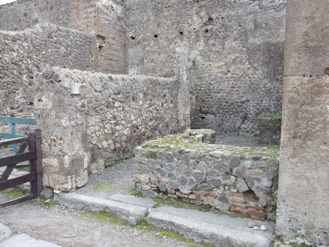VII.9.22 Pompeii. December 2007. Podium in south-west corner.