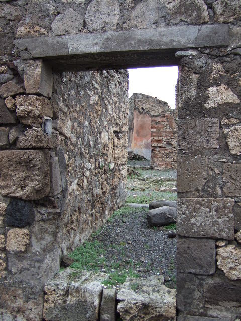 VII.9.39 Pompeii. December 2005. Looking north through doorway into atrium of VII.9.38.  


