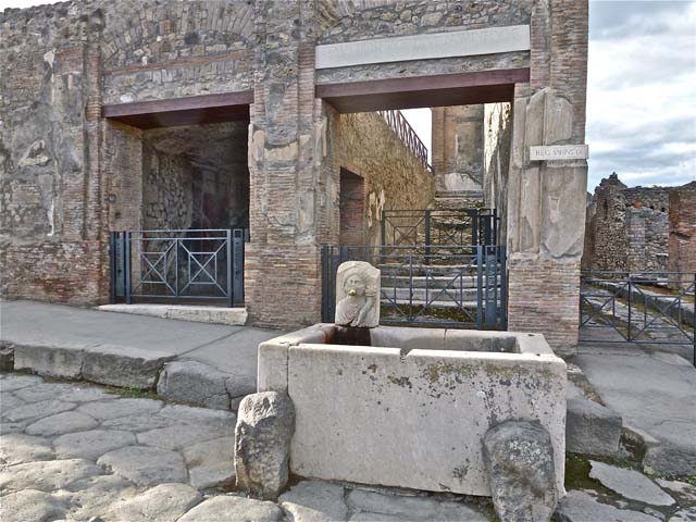 VII.9.68 Pompeii. March 2009. North west corner, and remains of wall painting on west wall.