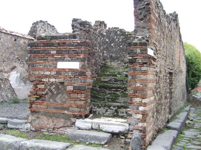 VII.10.1 Pompeii. December 2005. Looking east towards steps to upper floor.