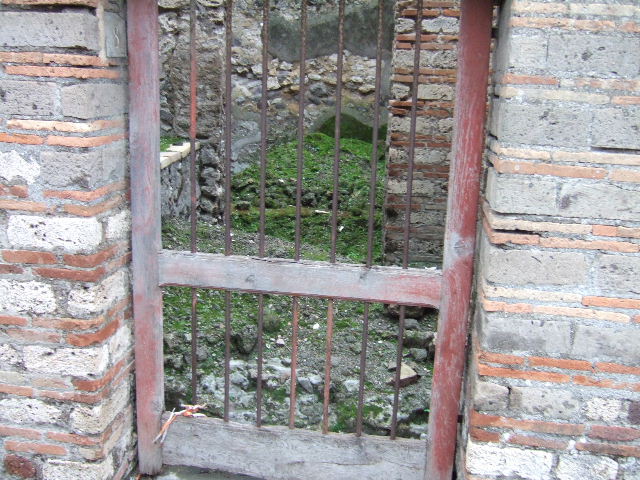 VII.10.8 Pompeii. December 2005. Looking south from kitchen area, towards small room or cupboard