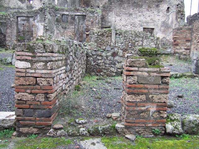 VII.10.11 Pompeii. December 2007. Looking west towards doorway to steps to upper floor.  
