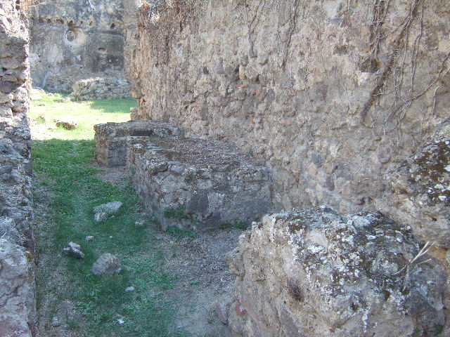 VII.12.13 Pompeii. September 2005. South wall with oven and bakery area.