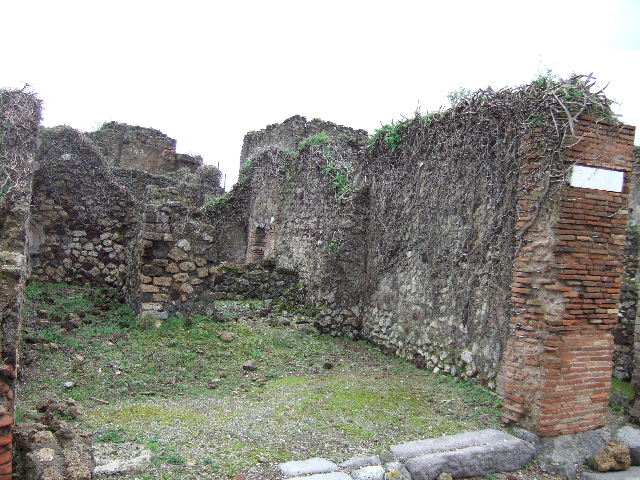 VII.12.34 Pompeii. December 2005. Looking east across bar-room. On the right at the rear was the doorway to the triclinium, on the rear left was a corridor leading to the latrine. On the extreme left, is a doorway linking to VII.12.35. According to Hobson, the siting of latrines is most often “off a narrow corridor”. In both VII.12.34 and 35, there would have been a great deal of privacy.
See Hobson, B., 2009. Latrinae et foricae: Toilets in the Roman World. London; Duckworth, (p.168)

