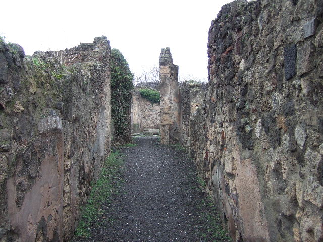 VII.13.8 Pompeii. December 2005. Fauces, north end, stairs to upper floor.