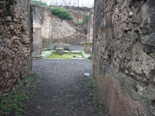 VII.13.8 Pompeii. December 2005. West side of atrium with doorway to triclinium leading to garden, cubiculum and ala.