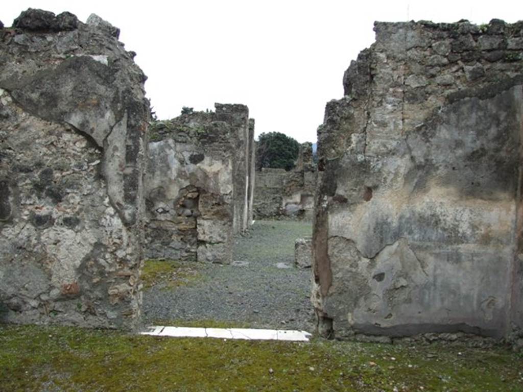 VII.14.5 Pompeii.  March 2009. Room 10.  Looking south through doorway into South Portico.