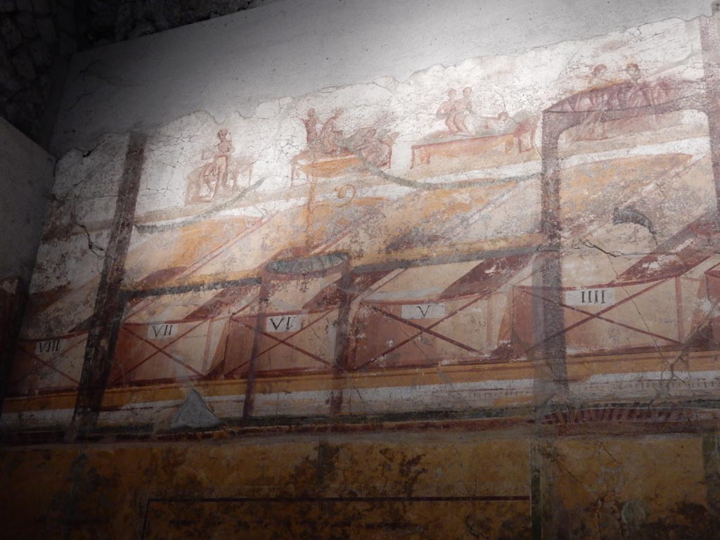 VII.16.a Pompeii. May 2015. 
Room 7, south wall, erotic paintings with numbers VIII, VII, VI, V and IIII beneath. Photo courtesy of Buzz Ferebee.
