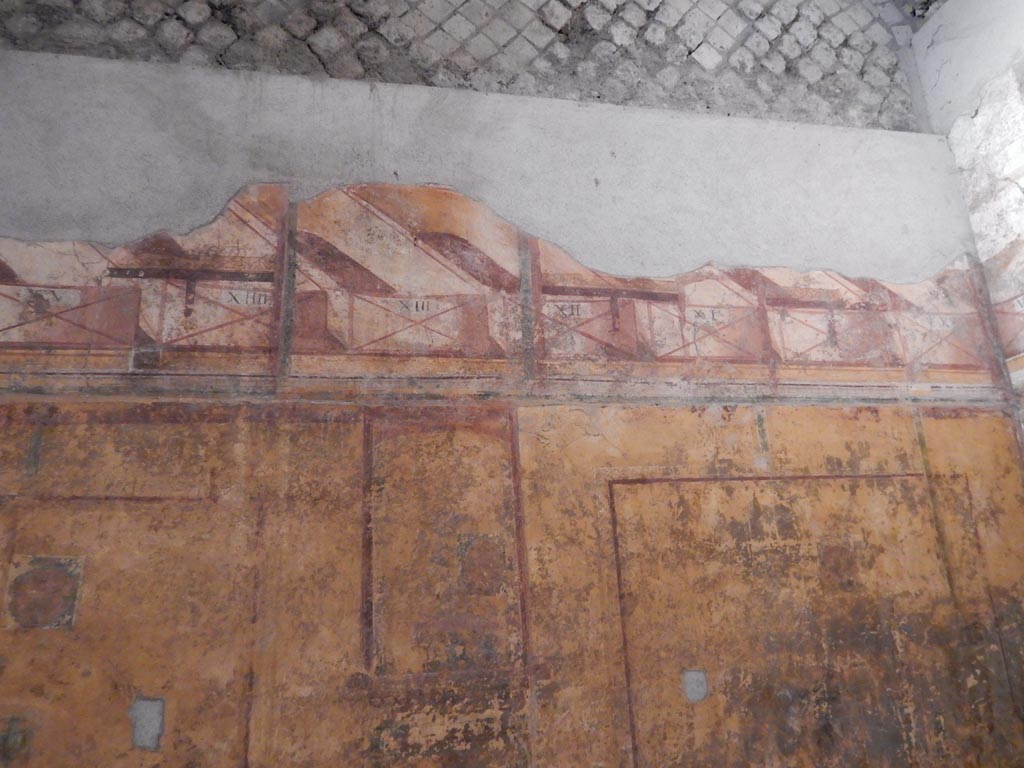 VII.16.a Pompeii. May 2015. Room 7, detail of east wall at south end. Photo courtesy of Buzz Ferebee.