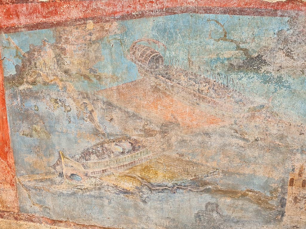 VII.16.a Pompeii. November 2023. Room 9, detail of naval scene on lower south wall. Photo courtesy of Giuseppe Ciaramella.
