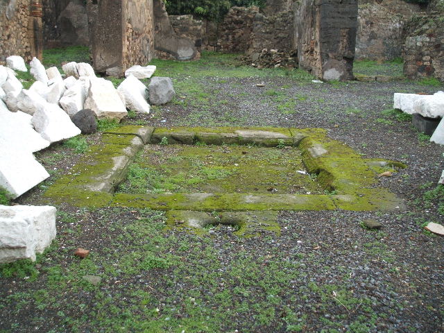VIII.3.31 Pompeii. May 2010. Doorway to oecus on the south side of the atrium. Looking east across it towards the other door in the east wall leading into the ala.